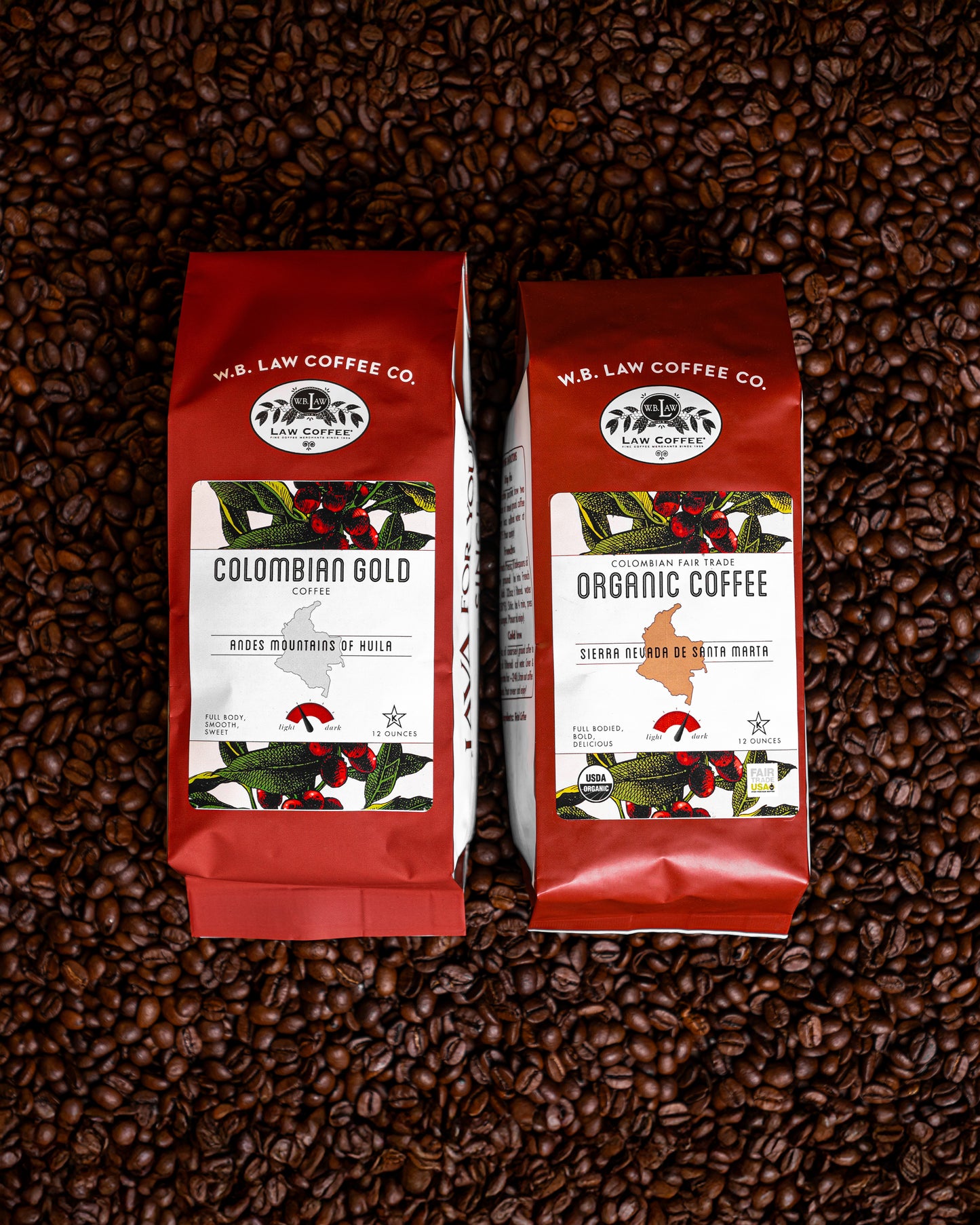 Two bags of coffee beans, one labeled 'Colombian Gold' and the other 'Organic Coffee', placed on a background of whole coffee beans.