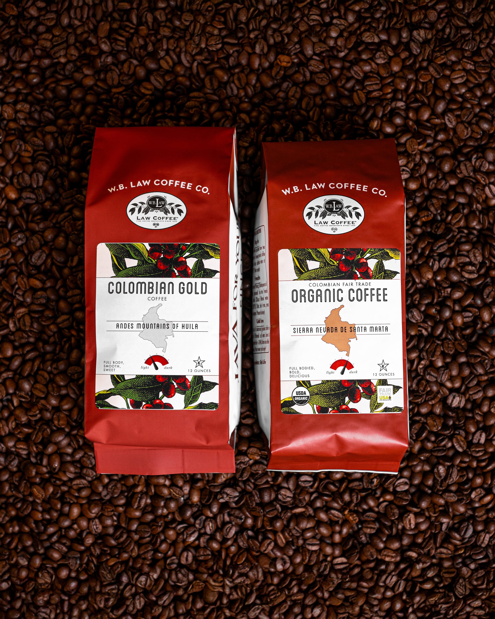 Two bags of coffee beans, one labeled 'Colombian Gold' and the other 'Organic Coffee', placed on a background of whole coffee beans.