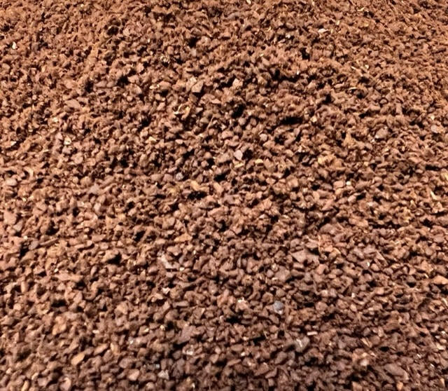 a pile of roasted and ground mexican alturra coffee.